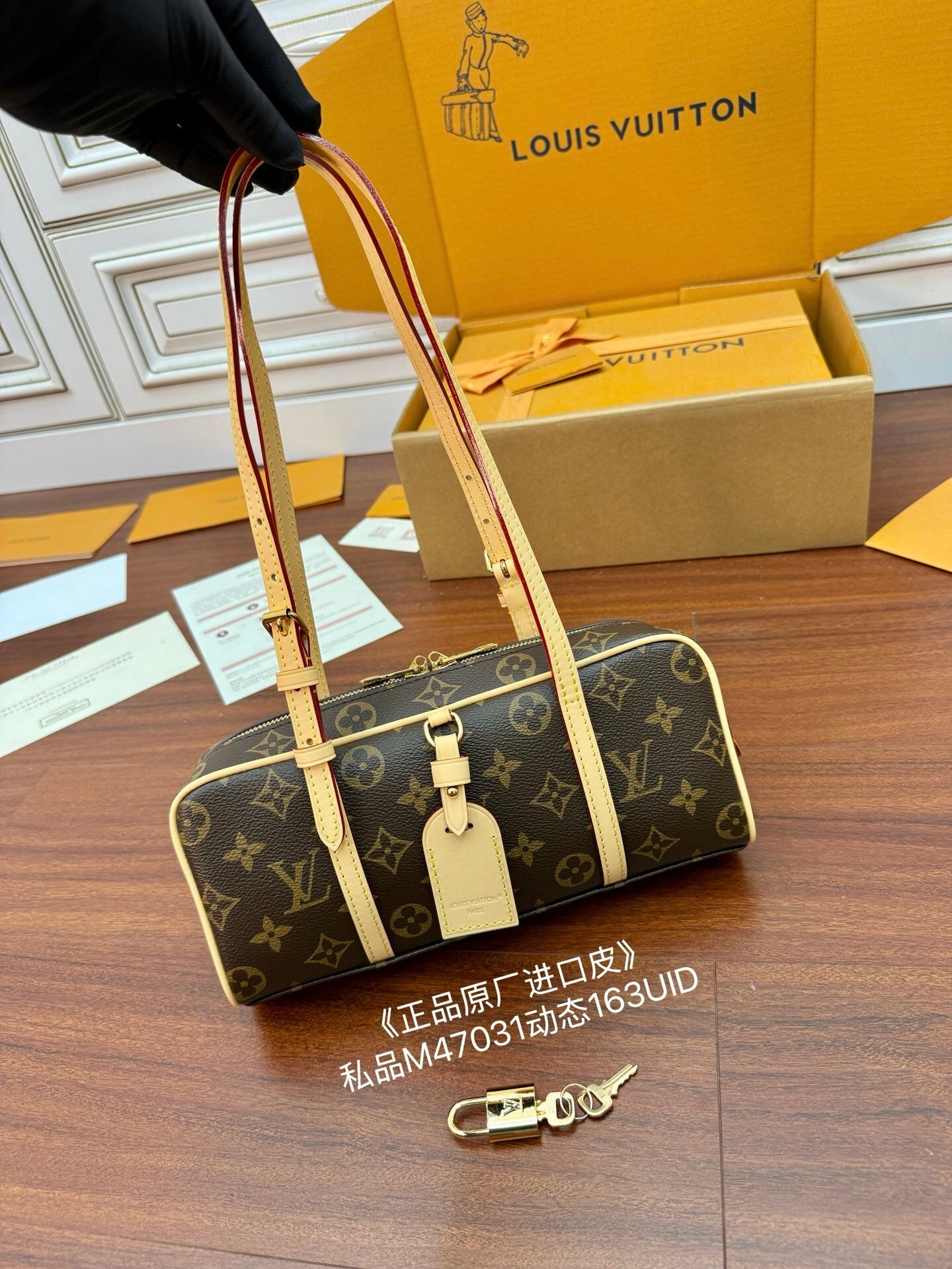 Louis Vuitton Hang On Handbag in Monogram Canvas