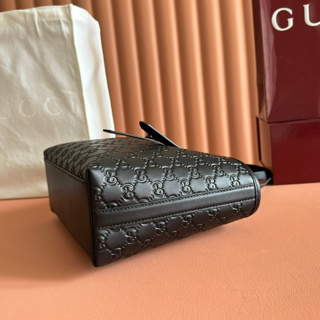 Gucci GG Emblem Medium Tote Bag in Black Embossed Leather