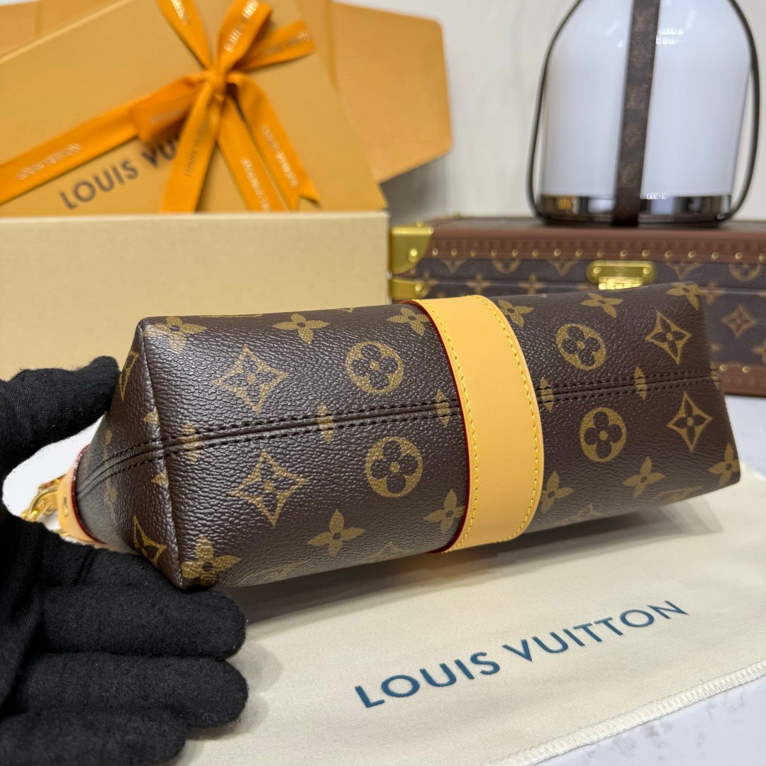 Louis Vuitton Pochette Mia Bag in Monogram Canvas