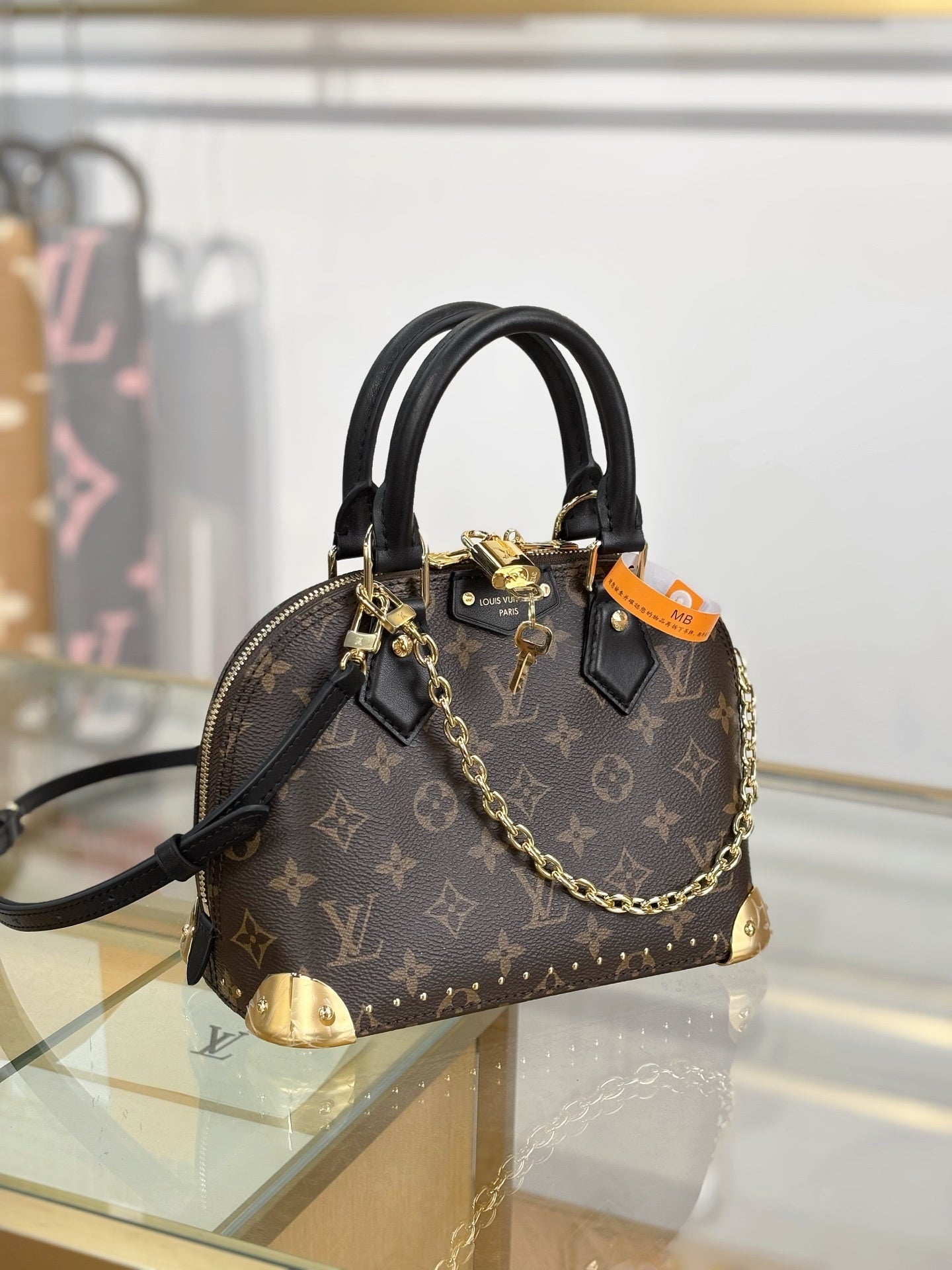 Louis Vuitton Alma Trunk BB Handbag in Monogram Canvas with Black Leather Trim