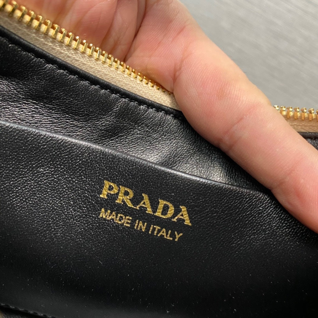Prada Arqué Calfskin Leather Shoulder Bag – Crescent Shape with Top Zip