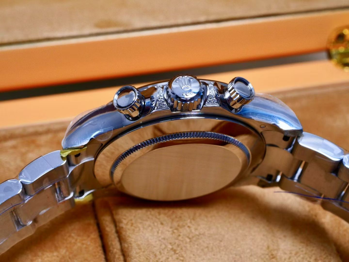 Rolex Oyster Perpetual Cosmograph Daytona White Gold, Diamond-Paved Dial, Rainbow Baguette Sapphire Bezel