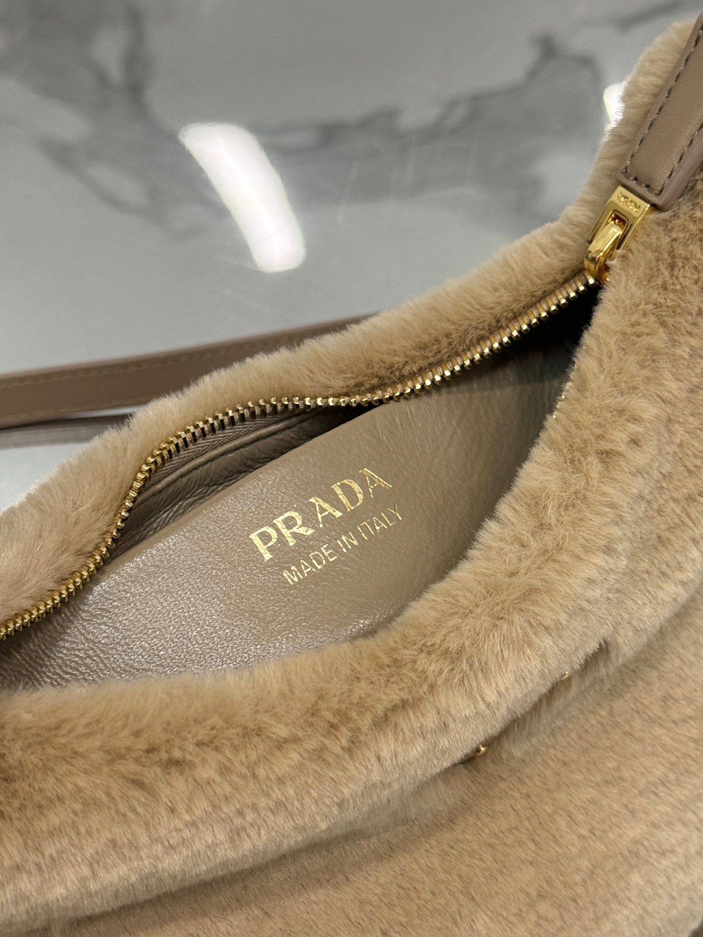 Prada Arqué Shearling Shoulder Bag – Leather Trim with Enamel Triangle Logo