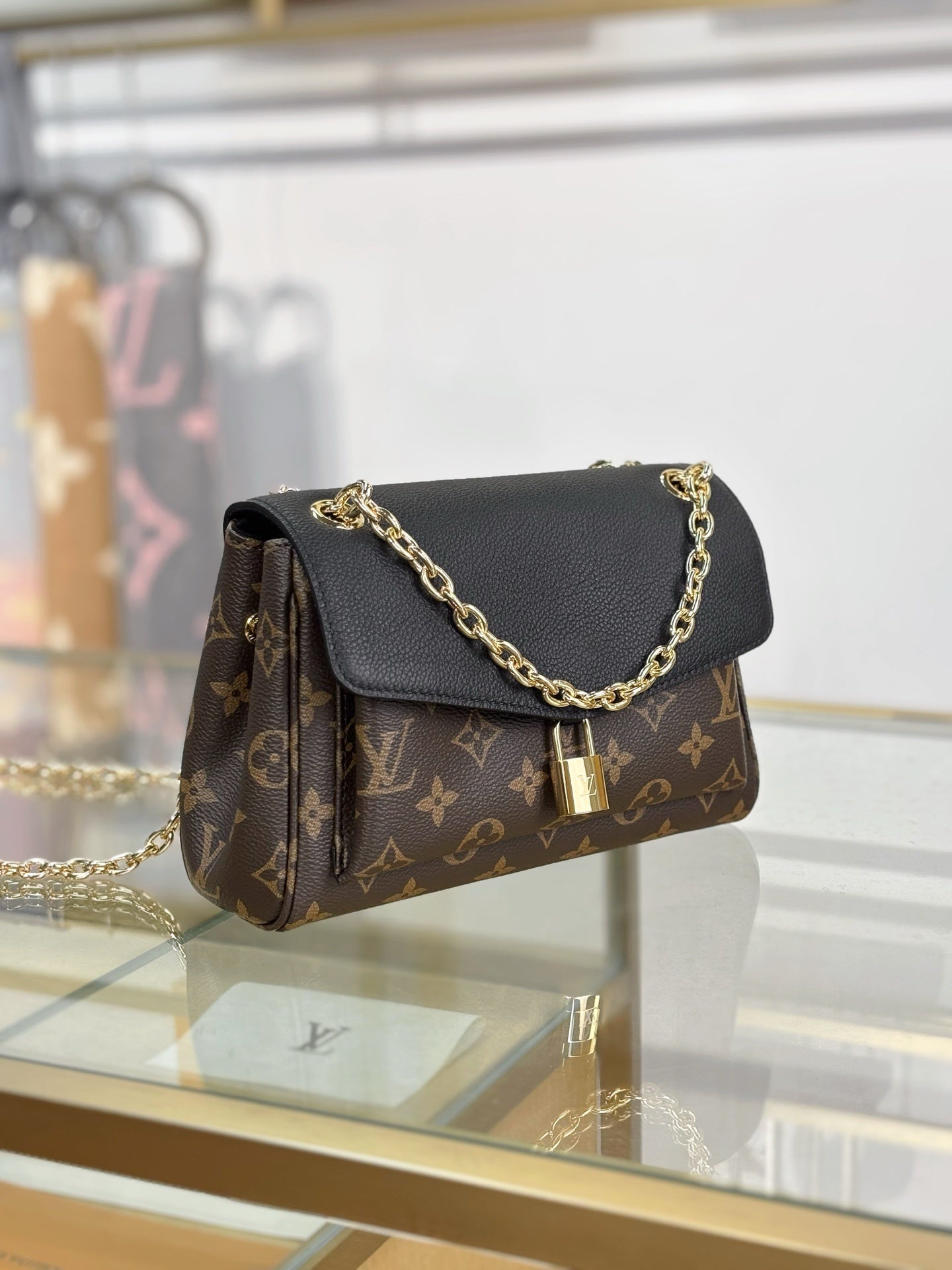 Louis Vuitton Saint Germain BB Bag in Monogram Canvas with Black Leather Trim & Gold Padlock