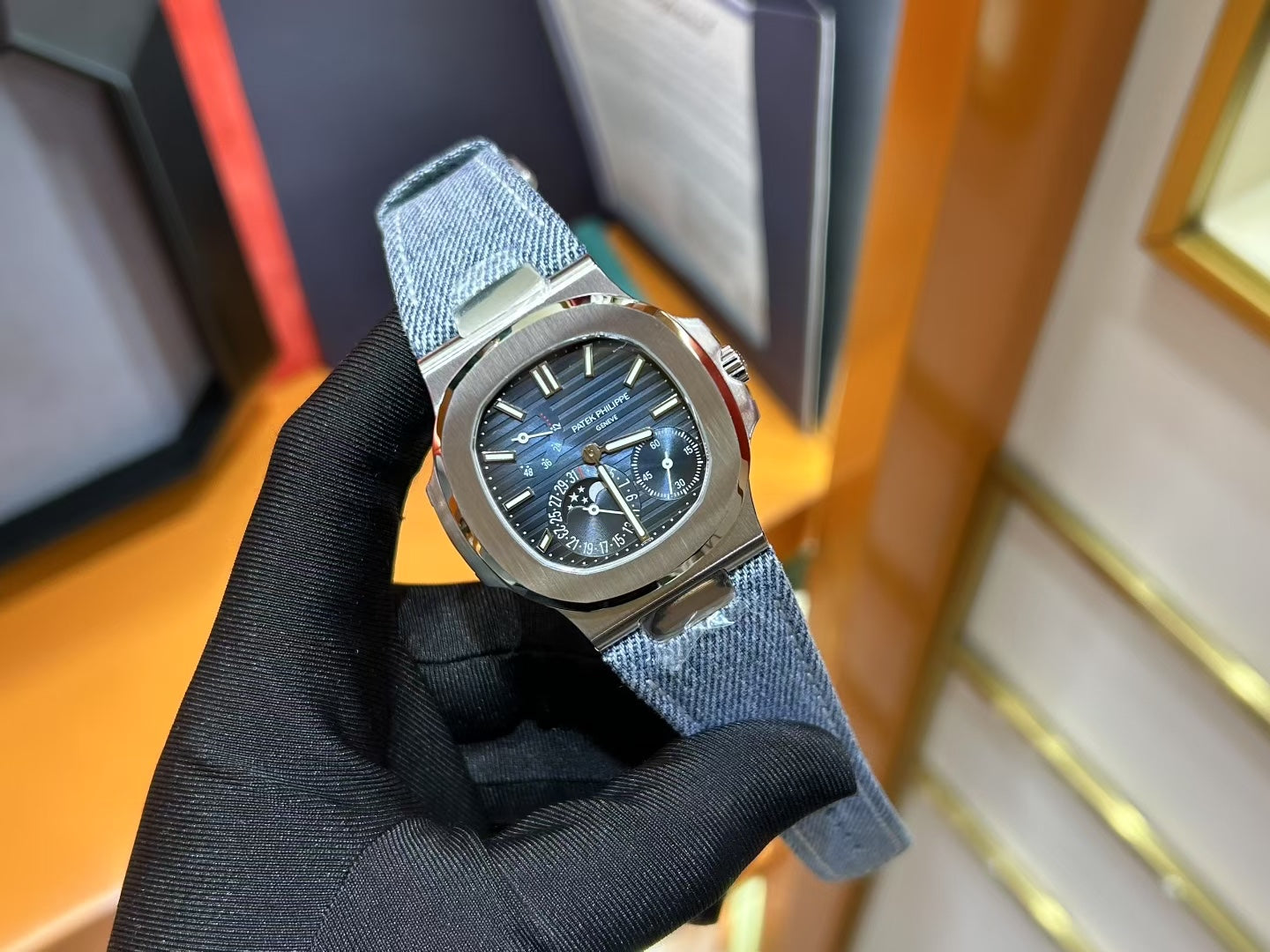 Patek Philippe Nautilus 5712 Luxury Stainless Steel Watch with Moonphase & Power Reserve