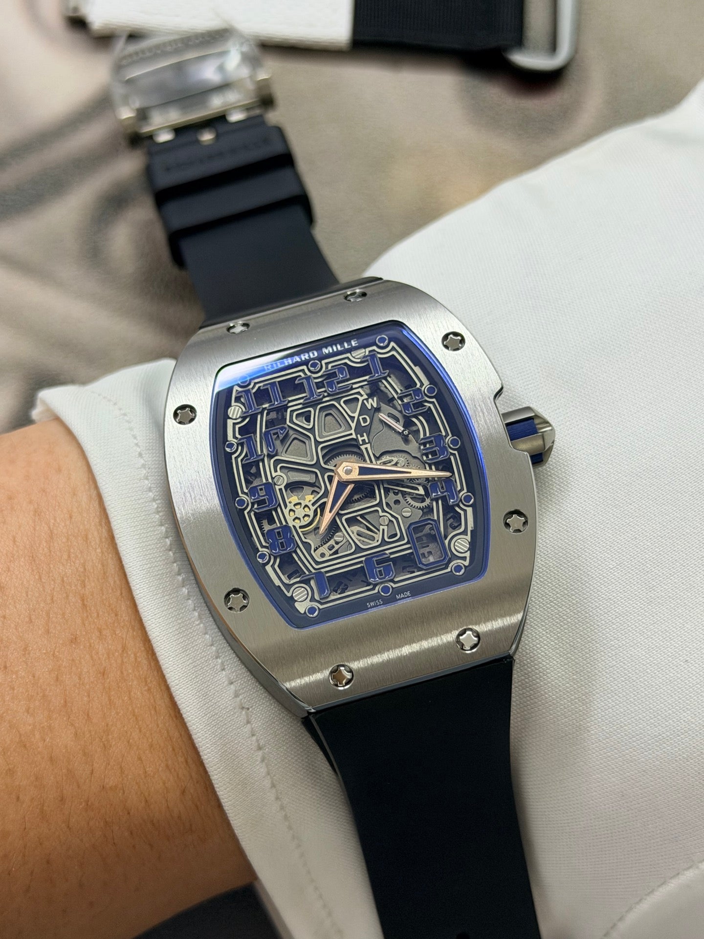 Richard Mille RM 67-01 Extra-Flat watch features a distinctive tonneau-shaped titanium case and a skeletonized dial. (Copy)