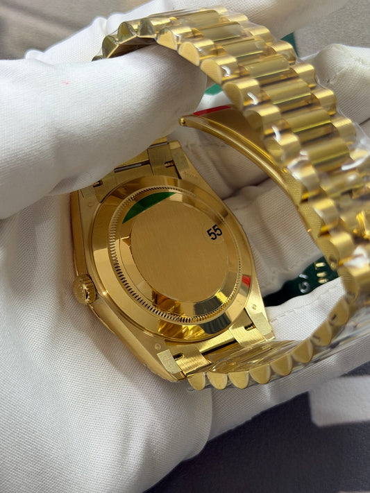 Rolex Day-Date 40 18K Yellow Gold with Champagne Stick Dial