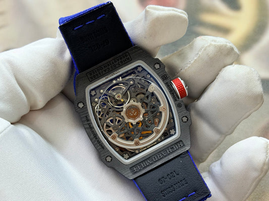 This Richard Mille RM 67-02 Sebastien Ogier watch features a lightweight Carbon TPT case and a vibrant blue elastic strap.