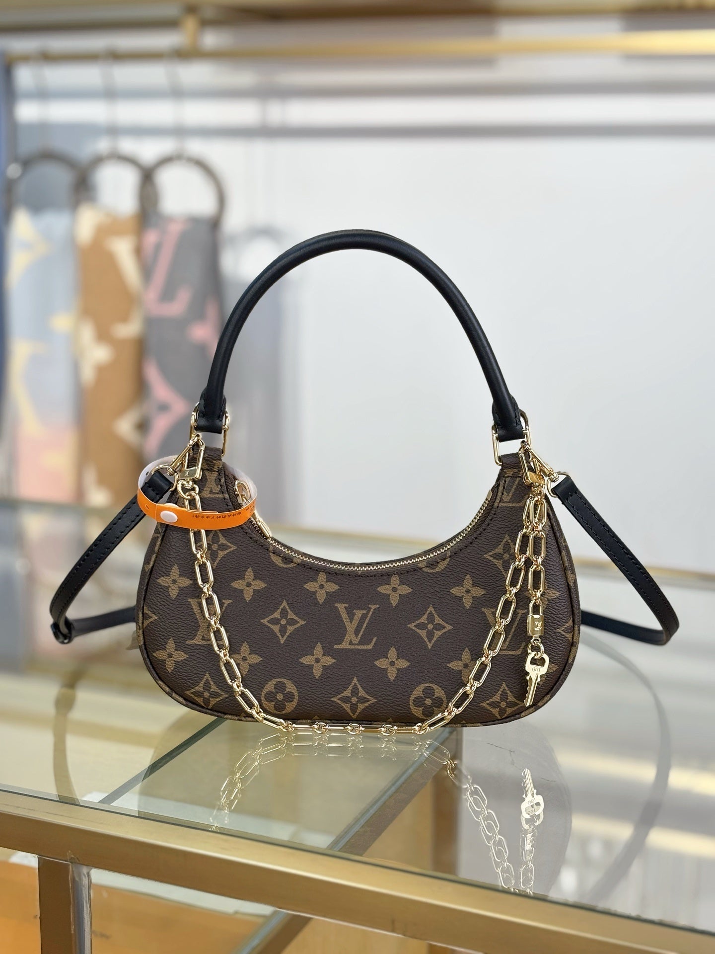 Louis Vuitton Catchy PM Bag – Monogram Canvas with Black Leather Trim & Gold Hardware