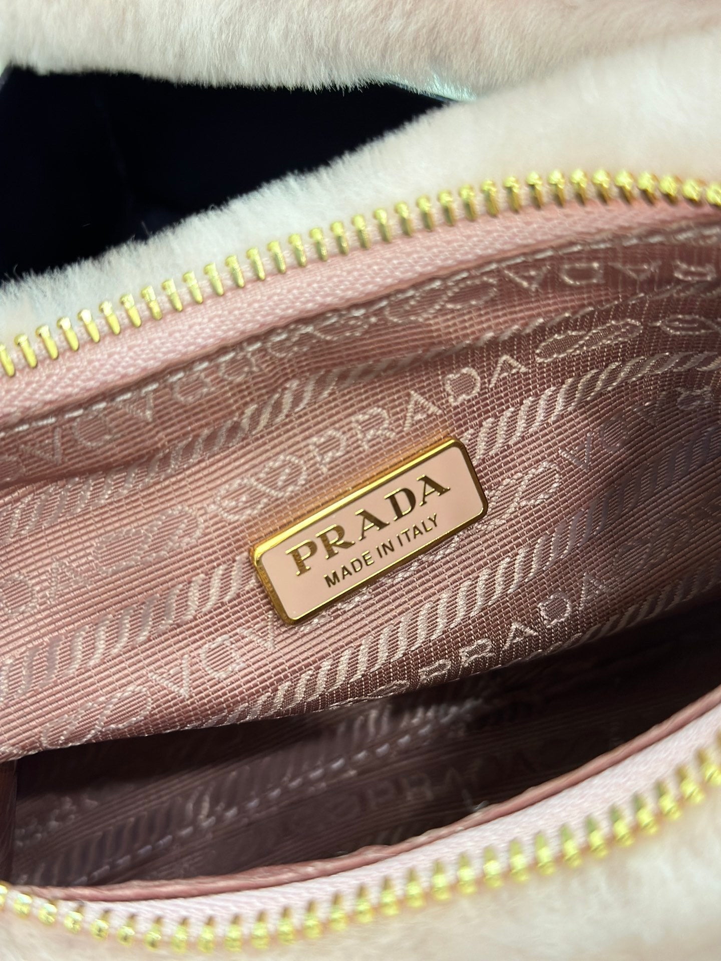 Prada Re-Edition Shearling Mini Bag – Pink with Gold-Tone Chain Strap & Enamel Logo