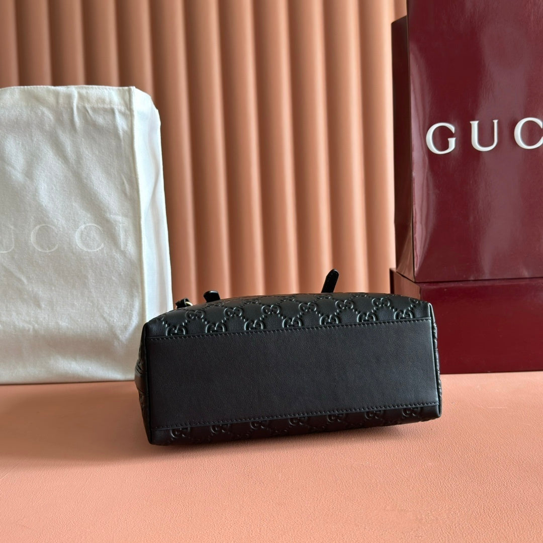 Gucci GG Emblem Medium Tote Bag in Black Embossed Leather