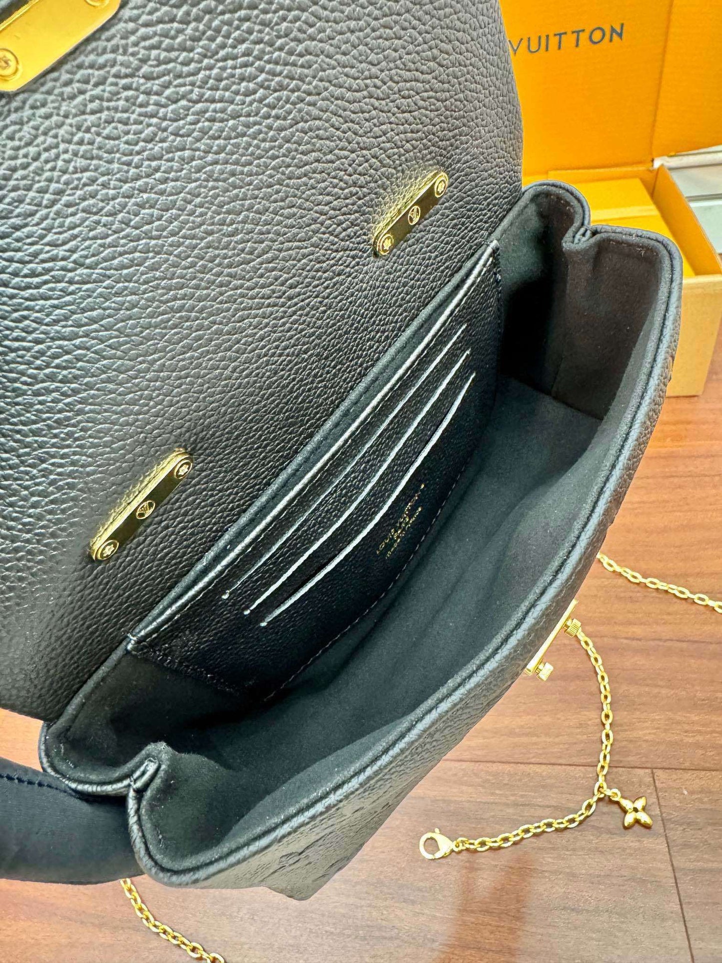 Louis Vuitton Nano Madeleine Bag in Black Monogram Empreinte Leather