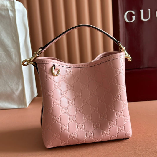 Gucci GG Emblem Small Bucket Bag in Pink Leather