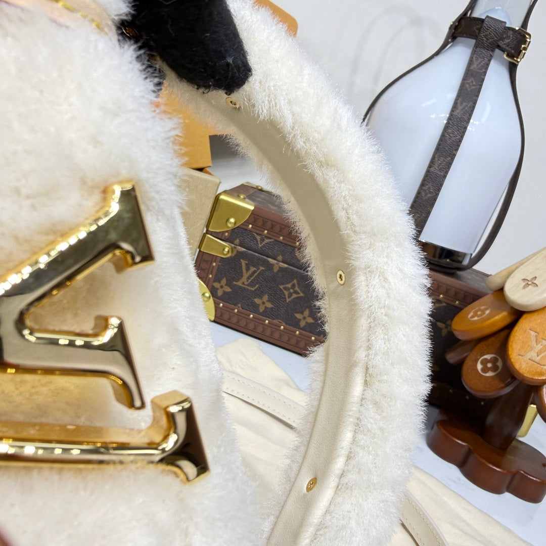 Louis Vuitton Capusnow Top-Handle Bag in Shearling with Removable Pompom Charm