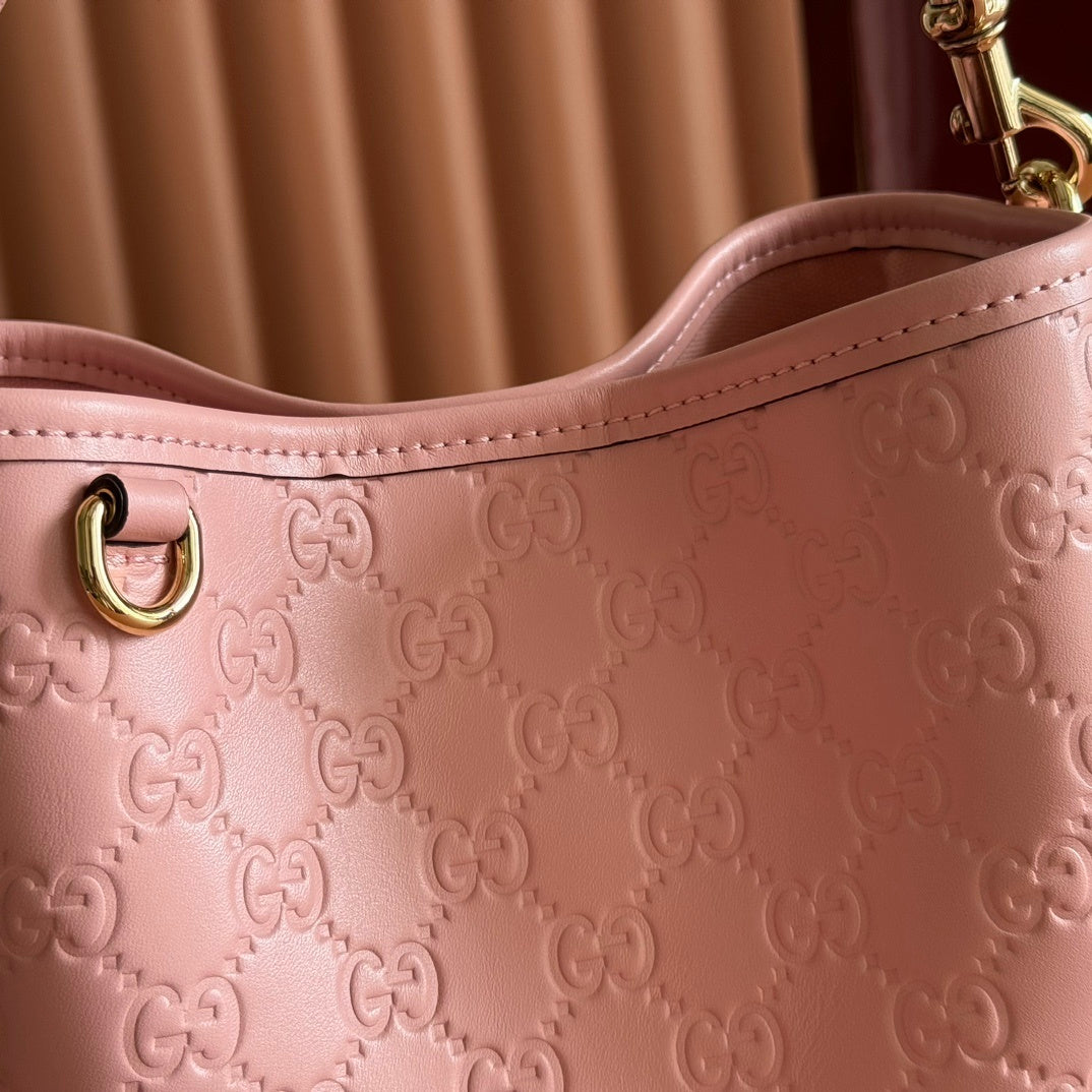 Gucci GG Emblem Small Bucket Bag in Pink Leather