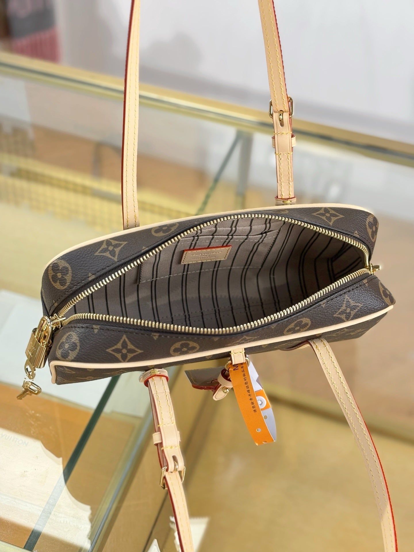 Louis Vuitton Hang On Handbag – Classic Monogram Canvas with Natural Cowhide Leather Trim