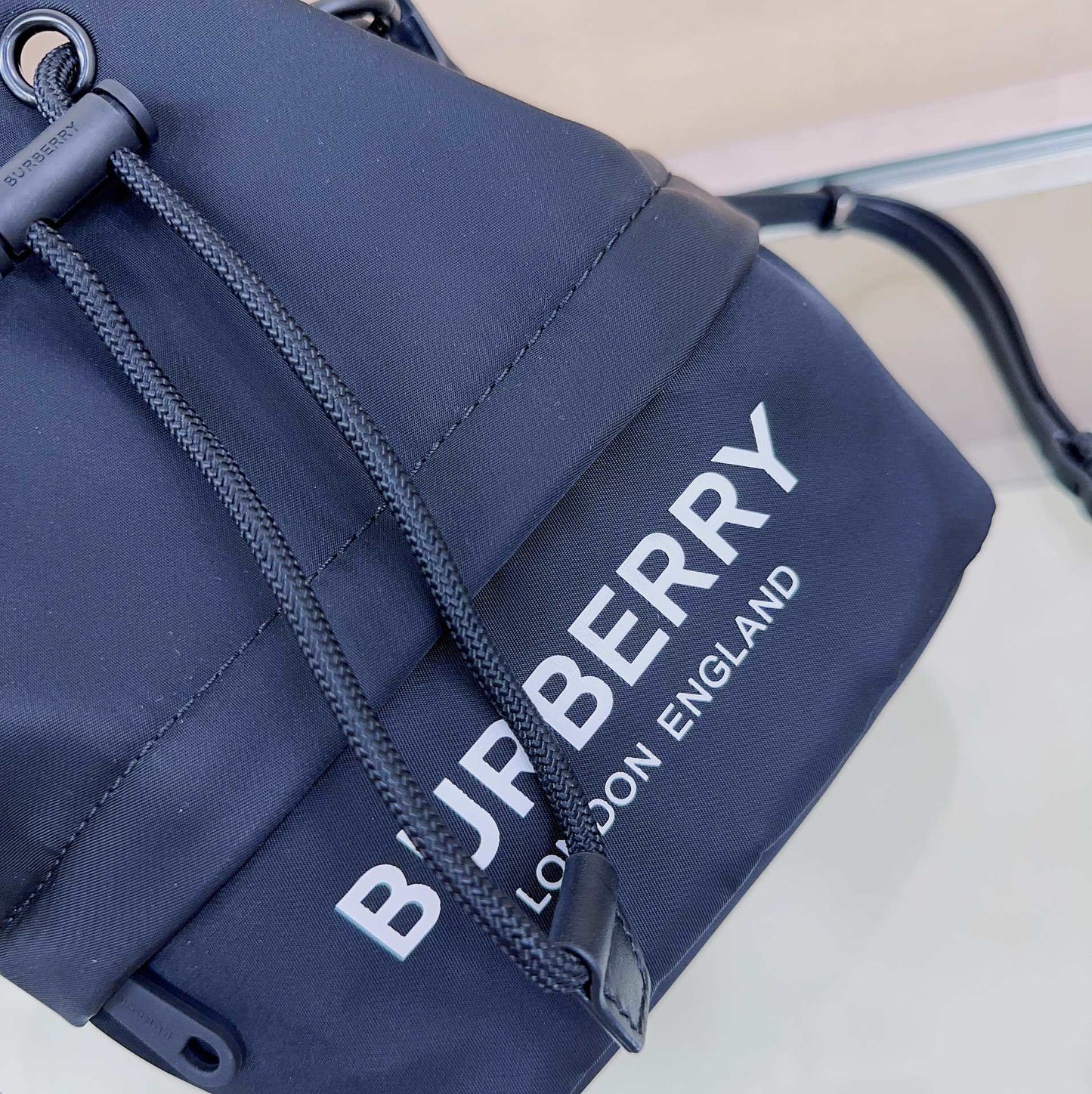 Burberry Phoebe Bucket Bag in Black Technical Nylon with White Logo Print