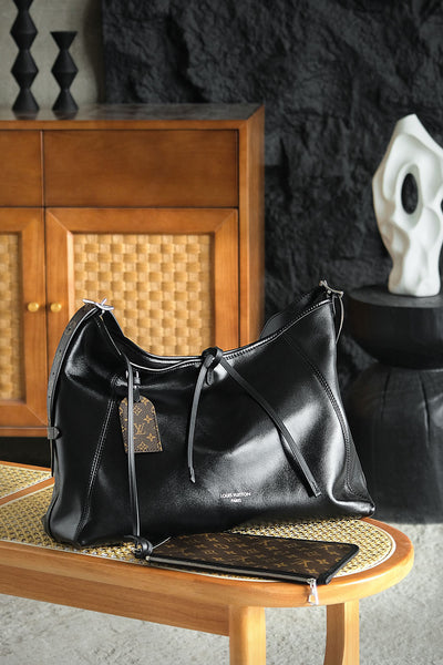 Louis Vuitton CarryAll Vibe MM Handbag – Black Lambskin Leather