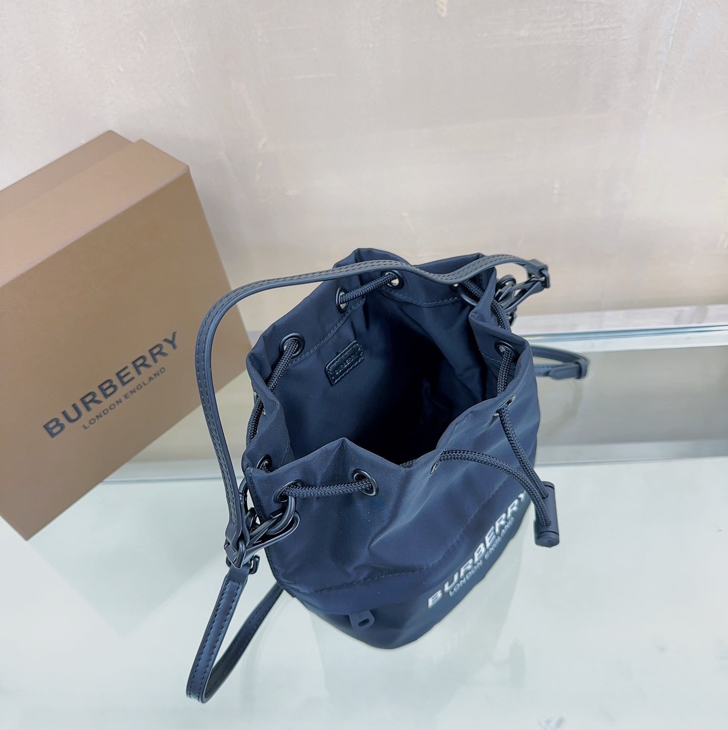 Burberry Phoebe Bucket Bag in Black Technical Nylon with White Logo Print