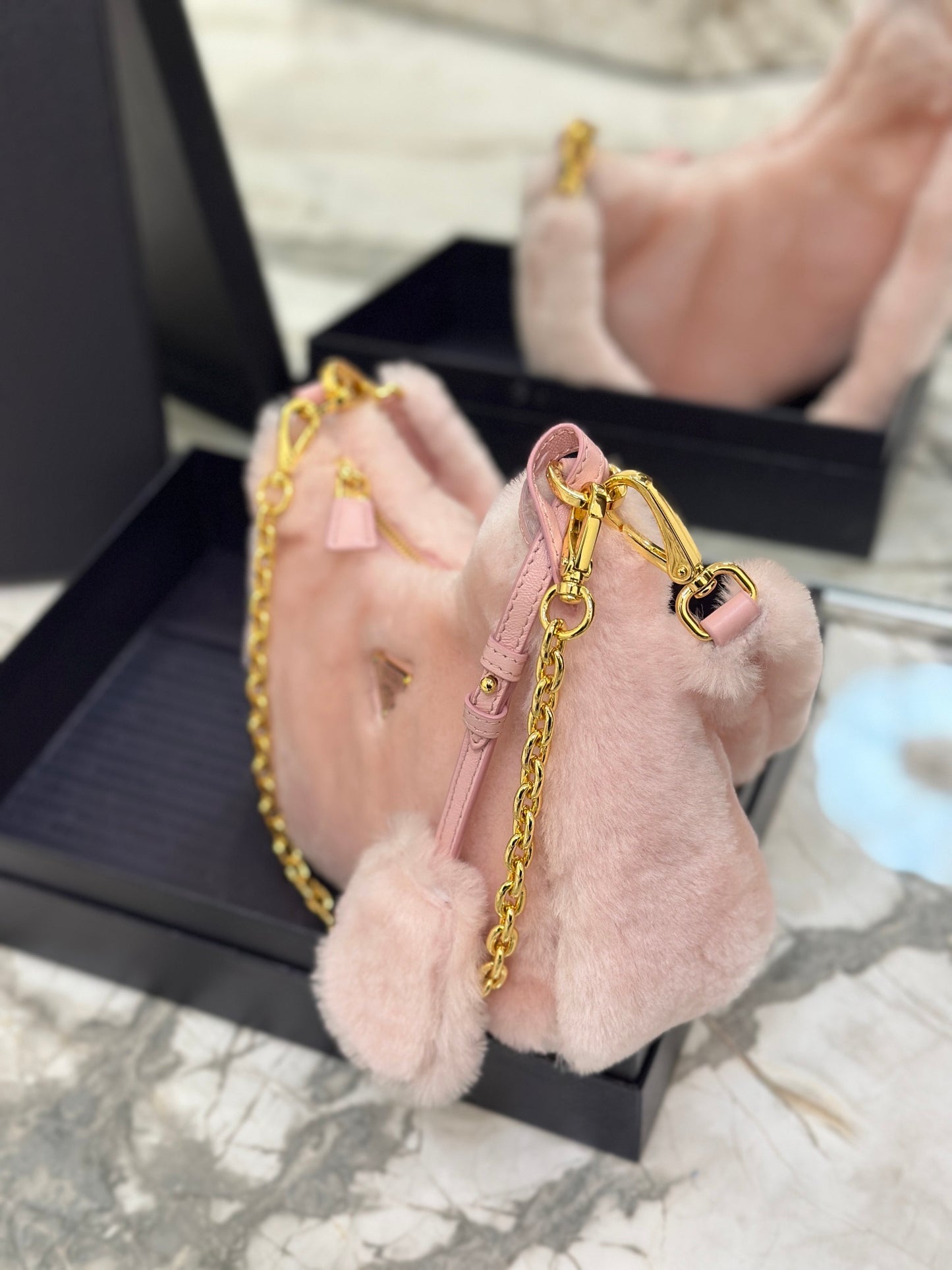 Prada Re-Edition Shearling Mini Bag – Pink with Gold-Tone Chain Strap & Enamel Logo