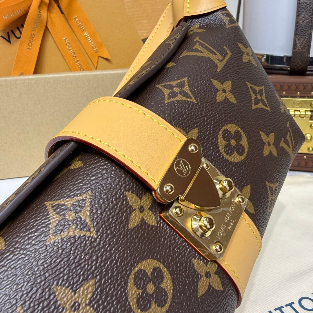 Louis Vuitton Pochette Mia Bag in Monogram Canvas