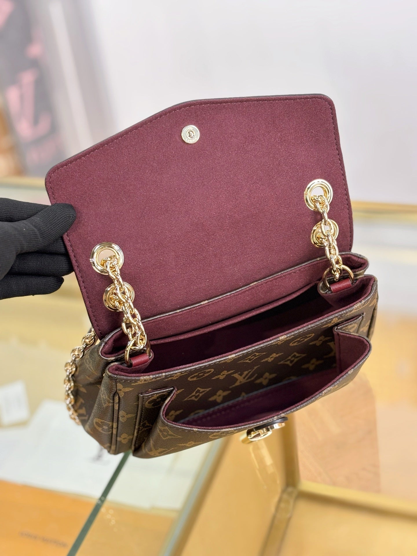 Louis Vuitton Saint Germain BB Bag in Monogram Canvas with Red Leather Trim & Gold Chain Padlock