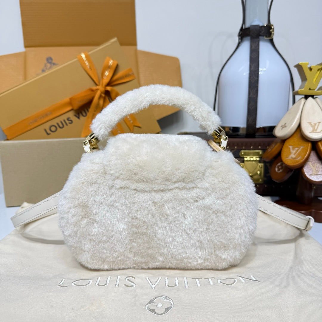 Louis Vuitton Capusnow Top-Handle Bag in Shearling with Removable Pompom Charm