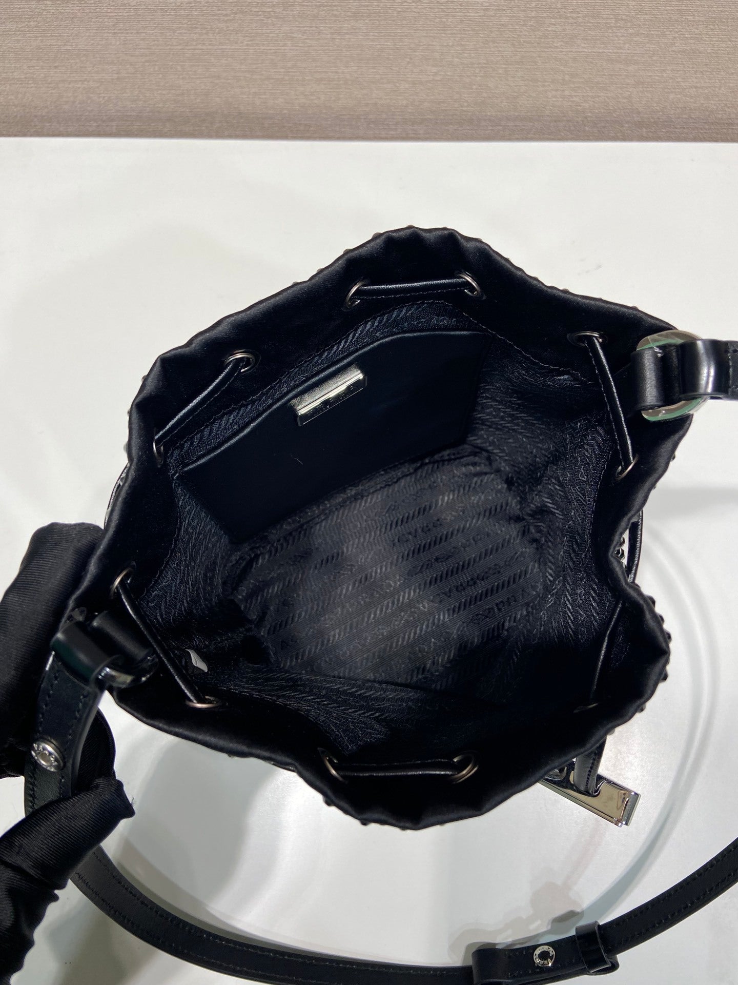 Prada Crystal-Embellished Mini Satin Bucket Bag – Black