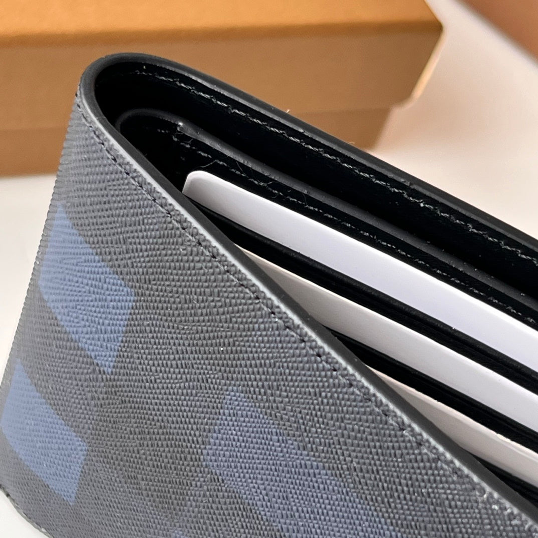 Burberry Men's Navy Textured Leather Bifold Wallet with Metal Logo