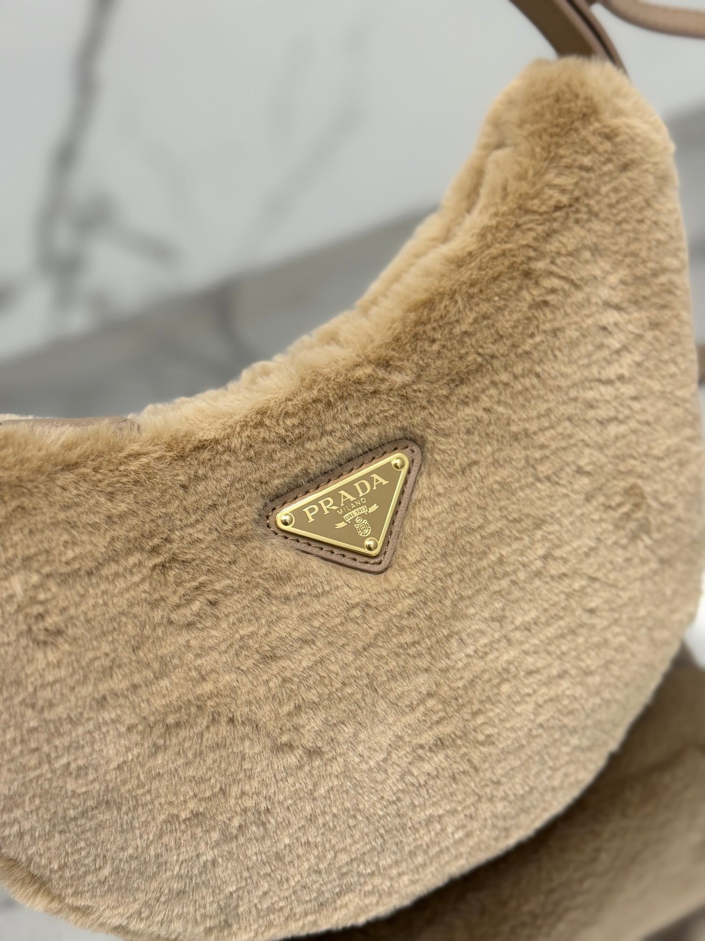 Prada Arqué Shearling Shoulder Bag – Leather Trim with Enamel Triangle Logo