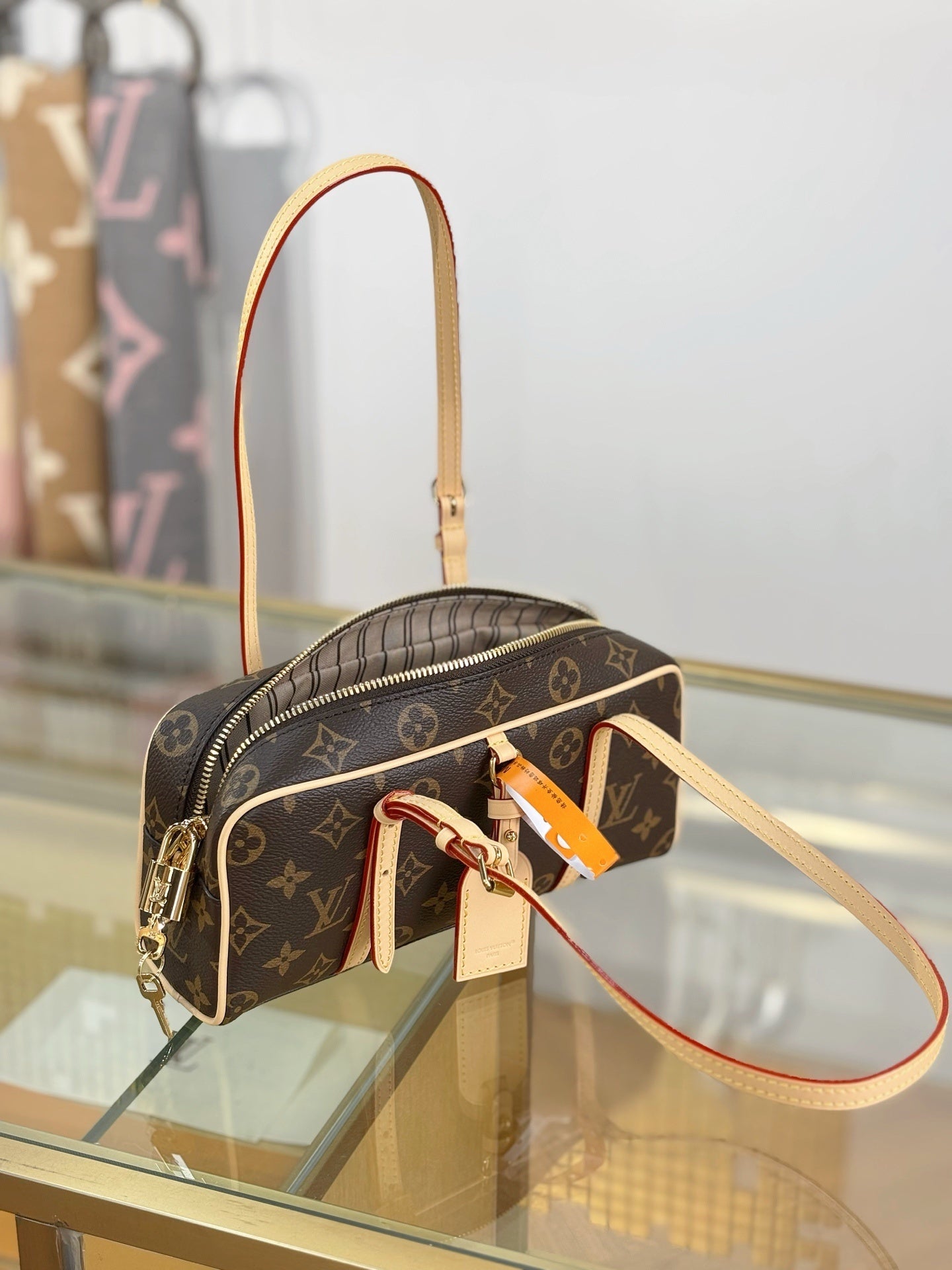 Louis Vuitton Hang On Handbag – Classic Monogram Canvas with Natural Cowhide Leather Trim