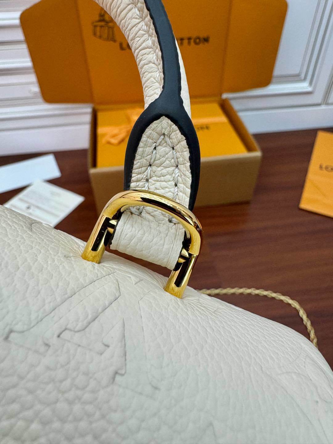 Louis Vuitton Nano Madeleine Bag in Crème Monogram Empreinte Leather