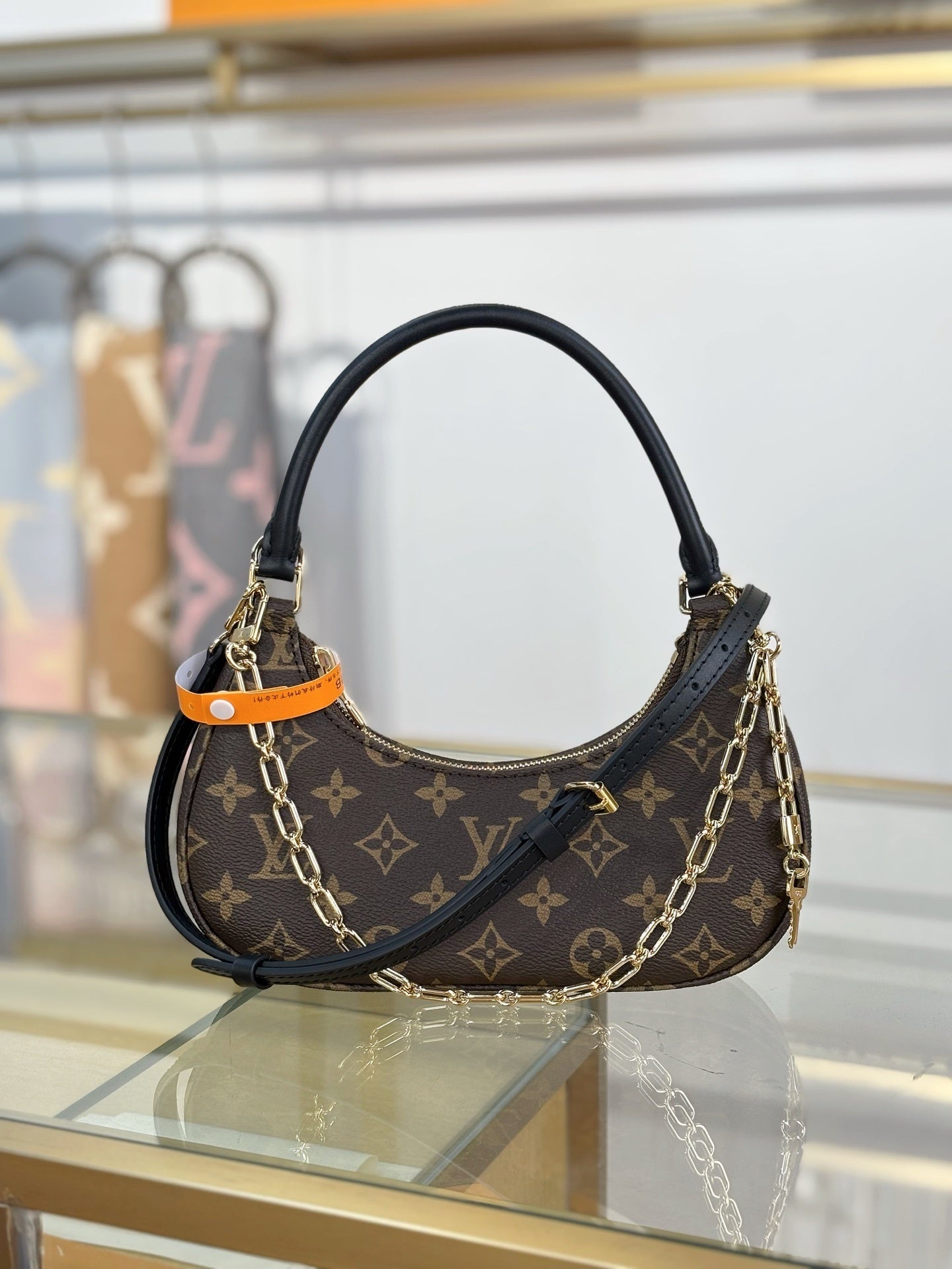 Louis Vuitton Catchy PM Bag – Monogram Canvas with Black Leather Trim & Gold Hardware