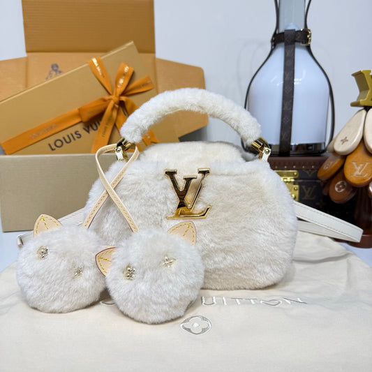 Louis Vuitton Capusnow Top-Handle Bag in Shearling with Removable Pompom Charm