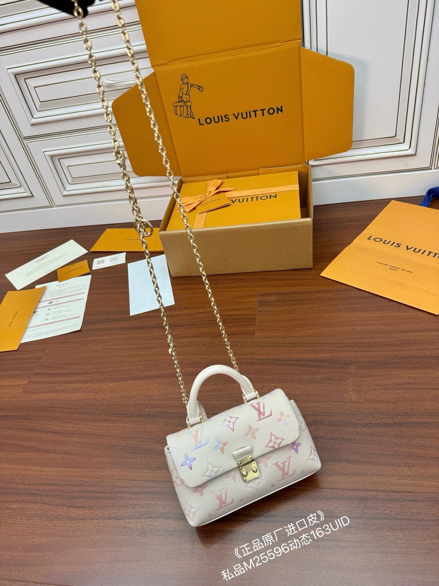 Louis Vuitton Nano Madeleine bag in the seasonal Snowy Pearl colorway, crafted from Monogram Empreinte leather.