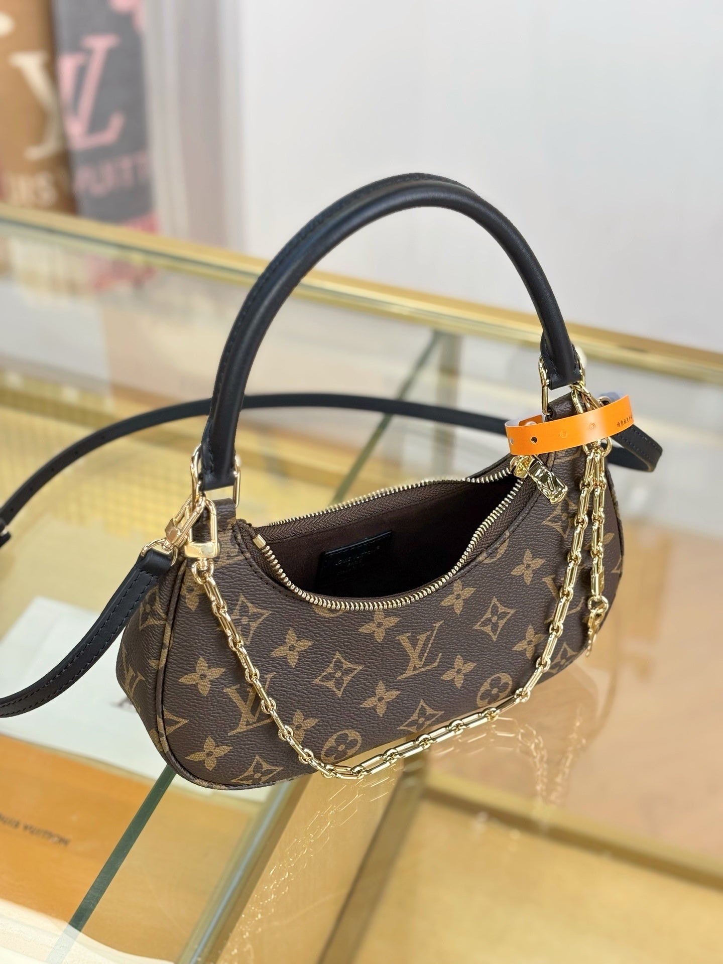 Louis Vuitton Catchy PM Bag – Monogram Canvas with Black Leather Trim & Gold Hardware