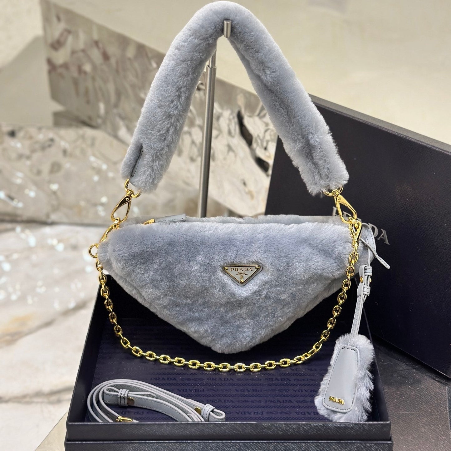Prada Re-Edition Mini Shearling Triangle Crossbody Bag – Grey