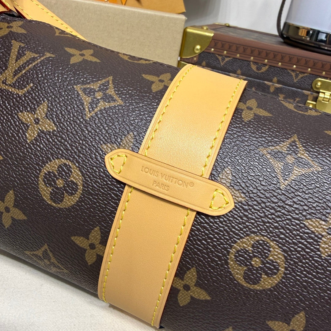Louis Vuitton Pochette Mia Bag in Monogram Canvas