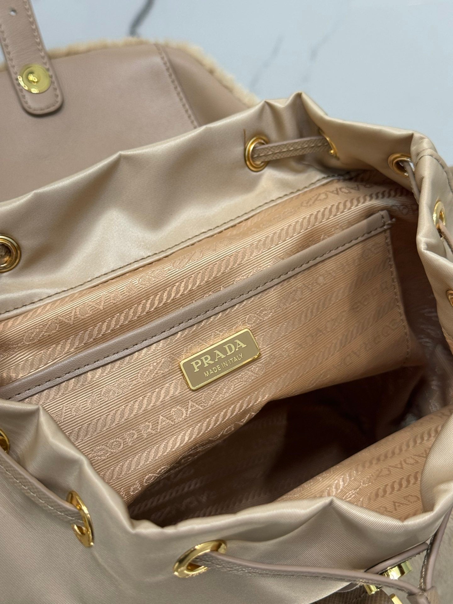 Prada Re-Nylon & Shearling Backpack – Beige