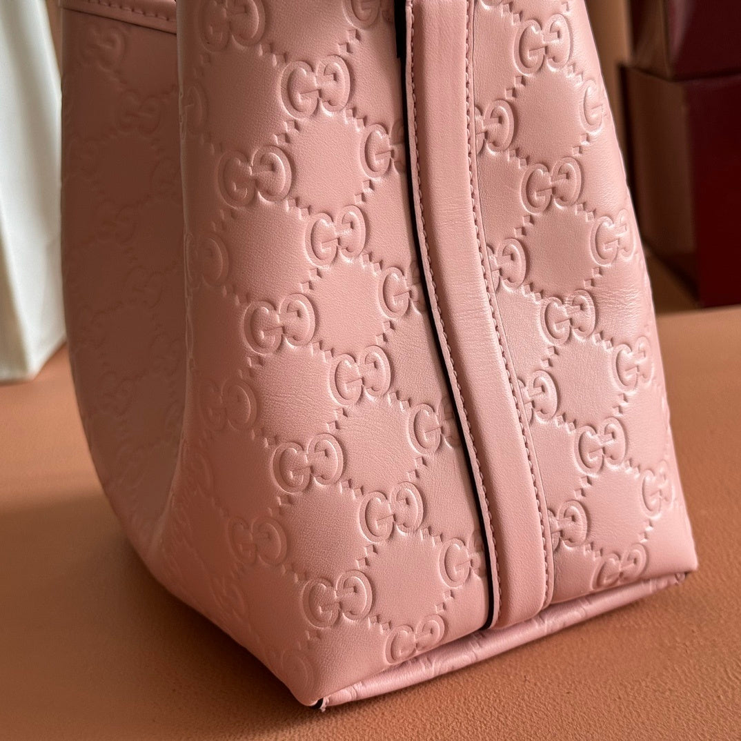 Gucci GG Emblem Small Bucket Bag in Pink Leather
