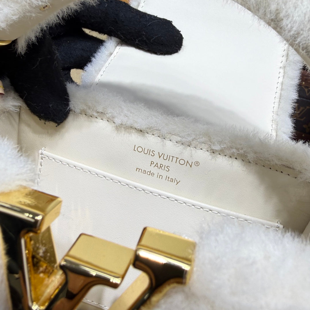 Louis Vuitton Capusnow Top-Handle Bag in Shearling with Removable Pompom Charm