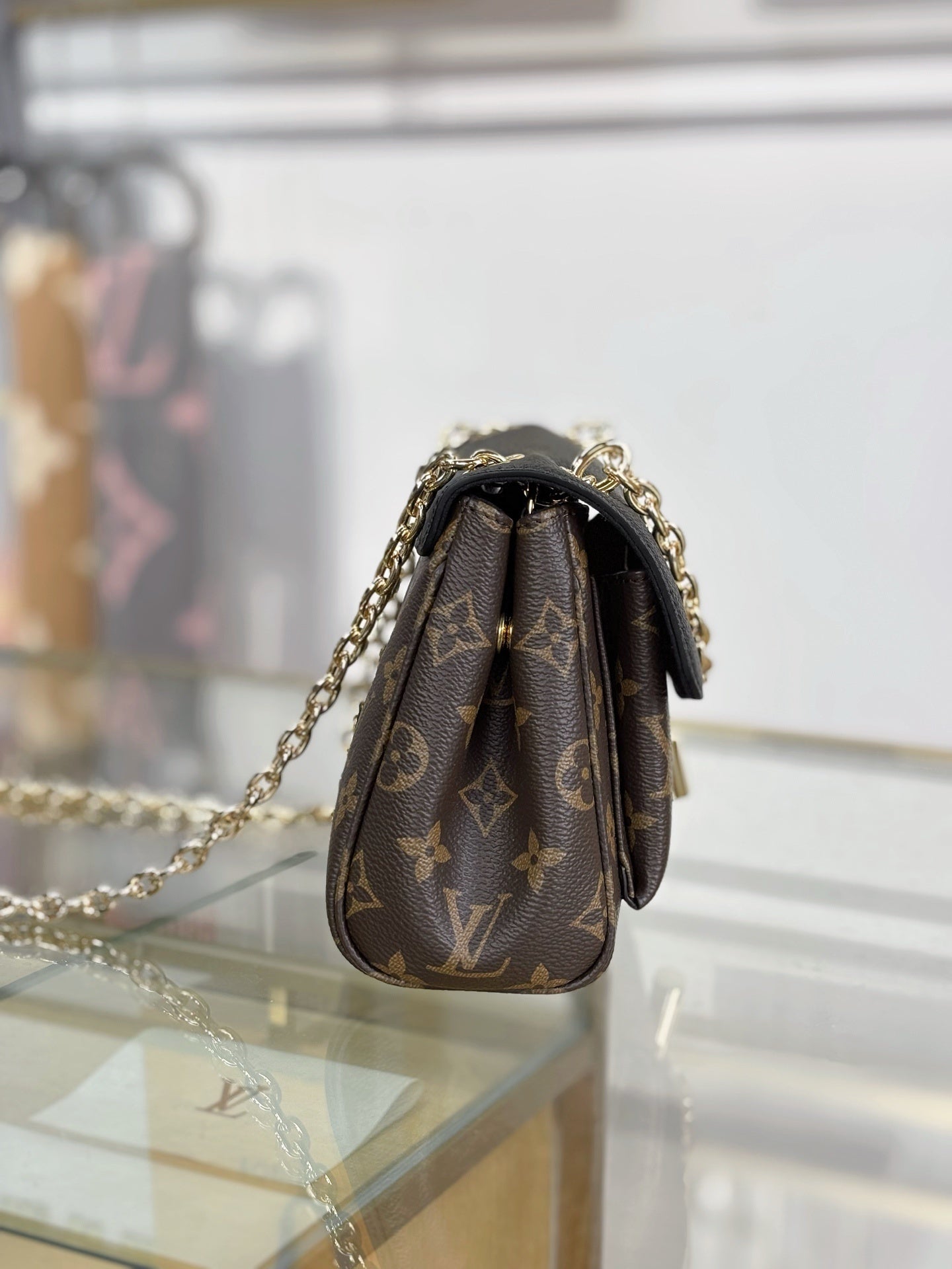 Louis Vuitton Saint Germain BB Bag in Monogram Canvas with Black Leather Trim & Gold Padlock