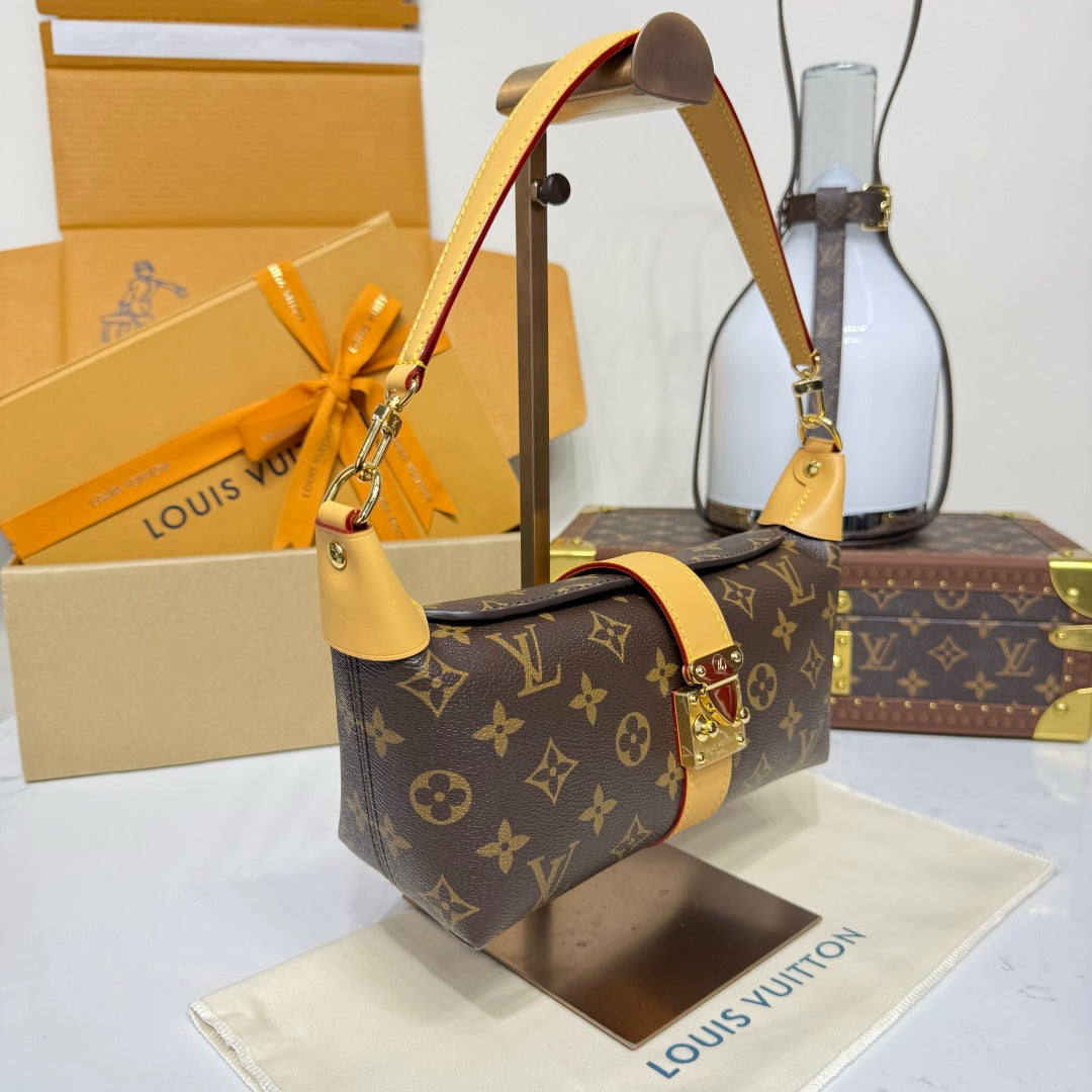 Louis Vuitton Pochette Mia Bag in Monogram Canvas