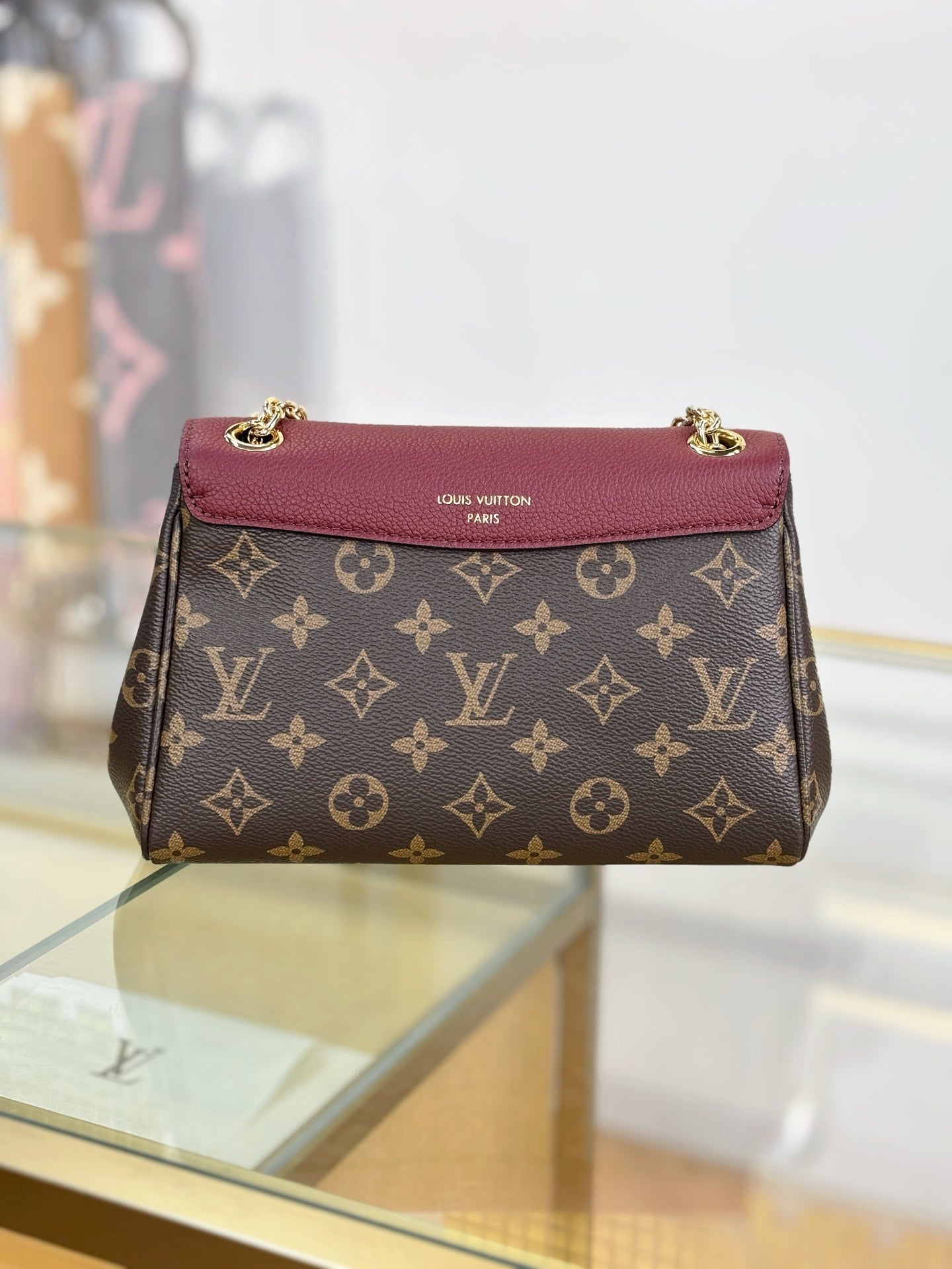 Louis Vuitton Saint Germain BB Bag in Monogram Canvas with Red Leather Trim & Gold Chain Padlock