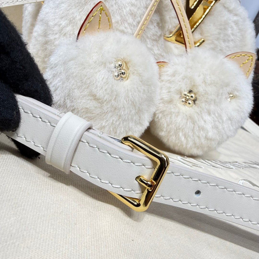 Louis Vuitton Capusnow Top-Handle Bag in Shearling with Removable Pompom Charm