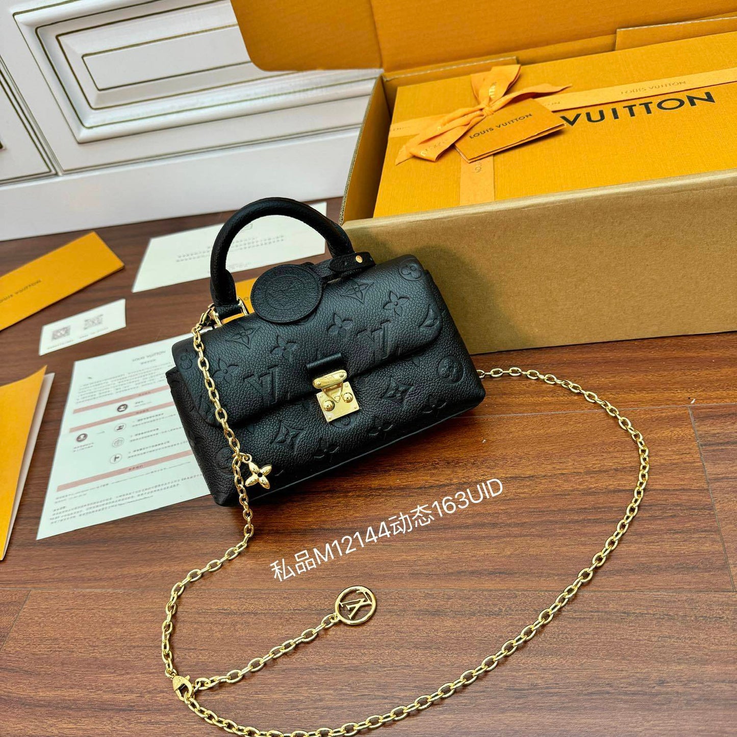 Louis Vuitton Nano Madeleine Bag in Black Monogram Empreinte Leather