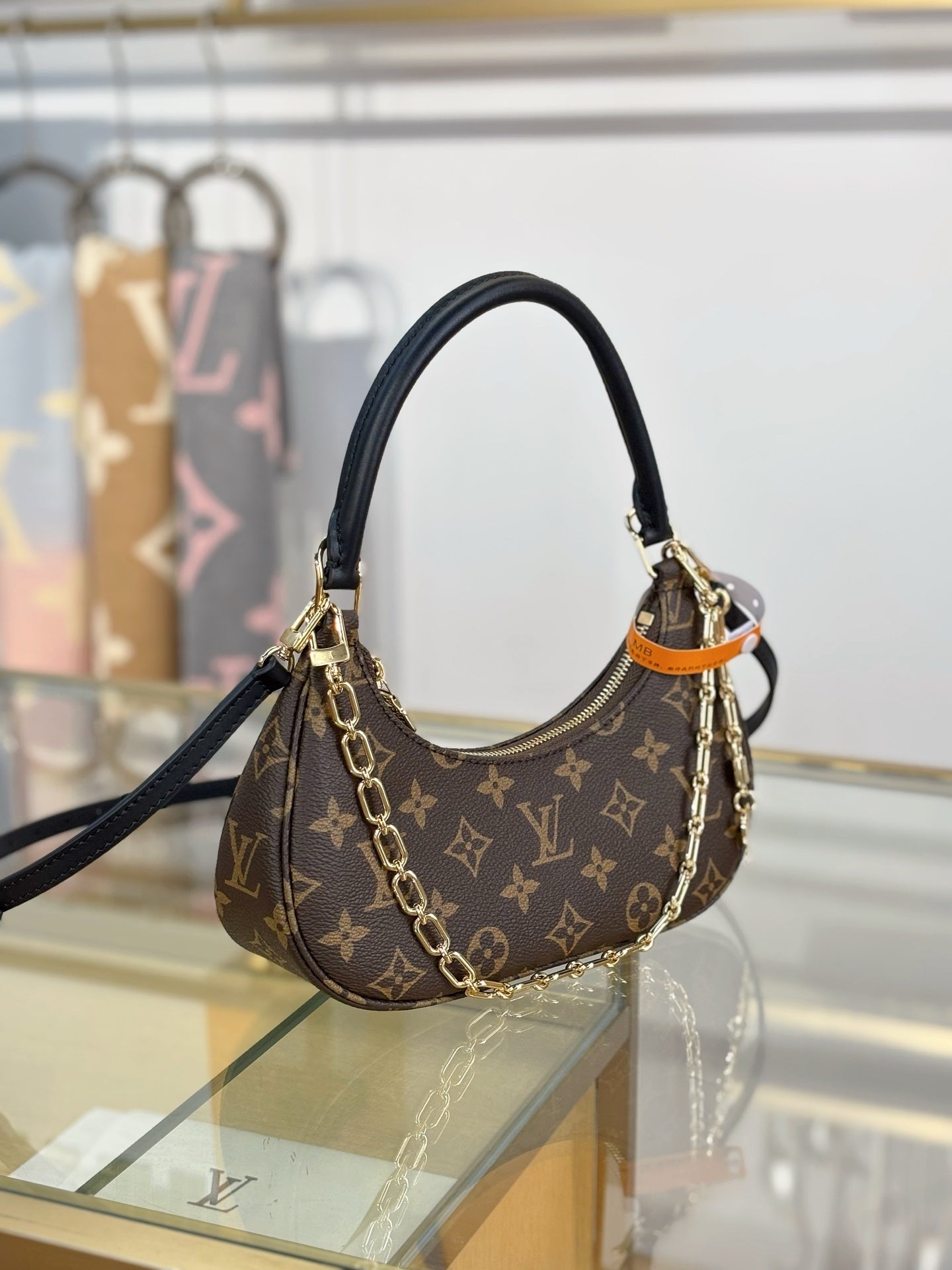 Louis Vuitton Catchy PM Bag – Monogram Canvas with Black Leather Trim & Gold Hardware