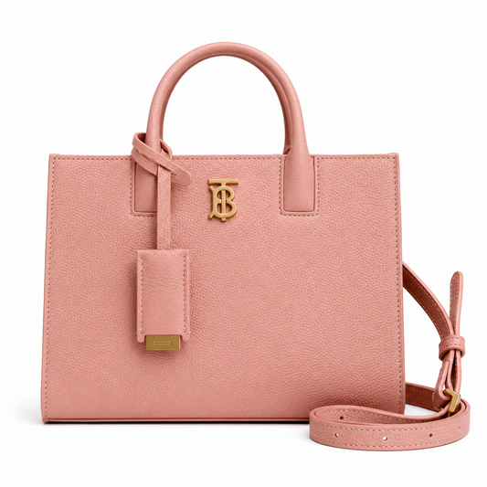 This is a Burberry Mini Frances Bag in dusky pink grainy leather, featuring the Thomas Burberry monogram in gold-tone hardware.