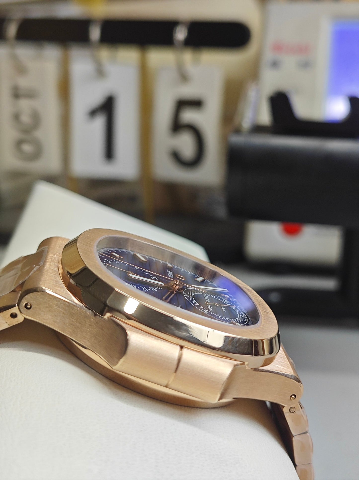 Patek Philippe Nautilus Travel Time Chronograph 5990/1R-001 in Rose Gold with Blue Sunburst Dial