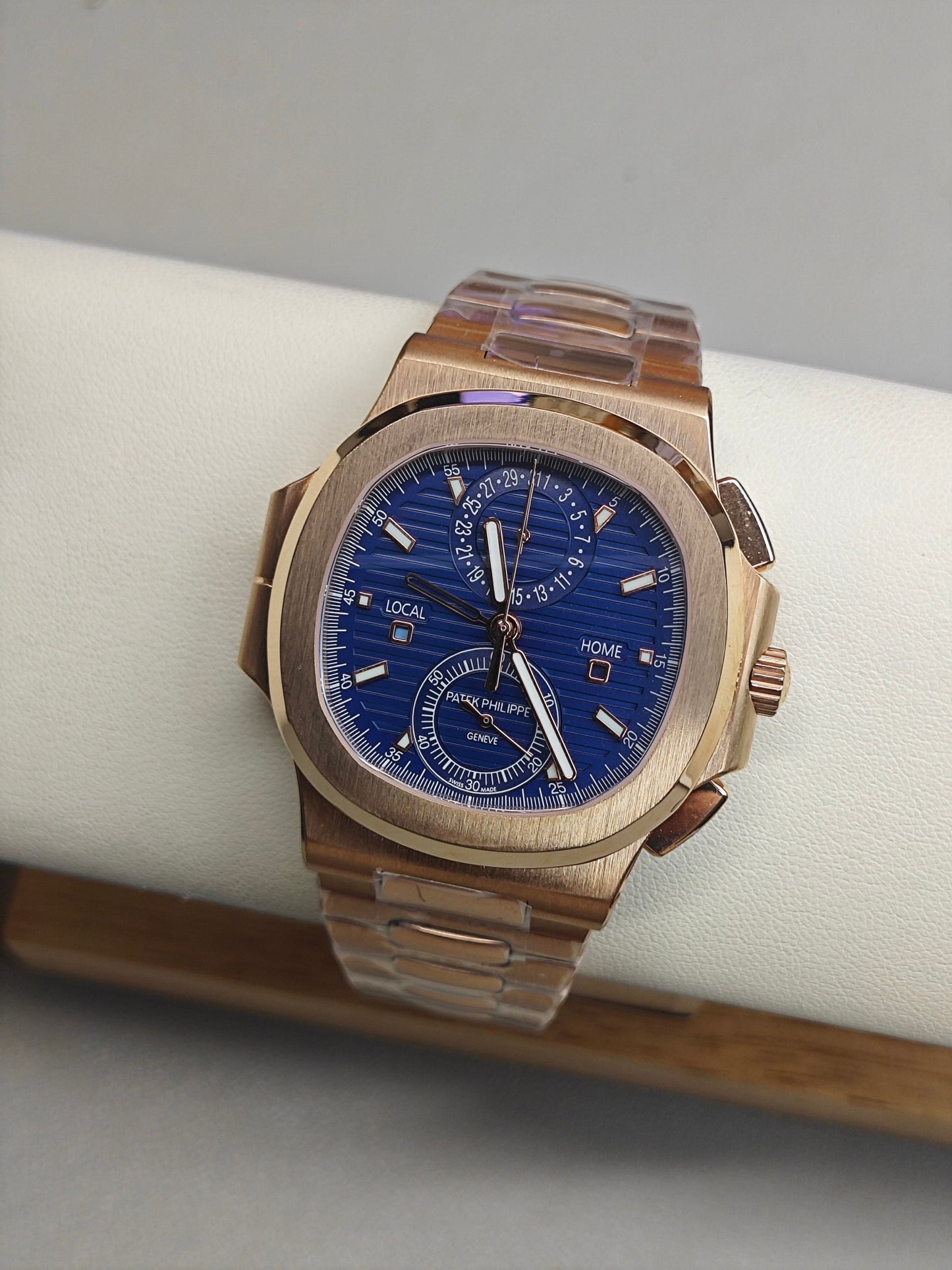Patek Philippe Nautilus Travel Time Chronograph 5990/1R-001 in Rose Gold with Blue Sunburst Dial